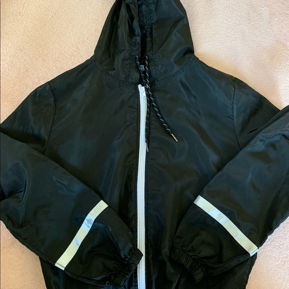 black windbreaker